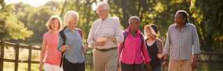 Group of older adults taking a walk outdoors