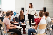 Teenage Students Studying Percussion In Music Class Teenage Students Studying Percussion In Music Class