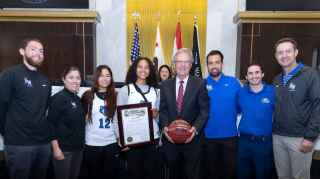 Volunteers receiving recognition award